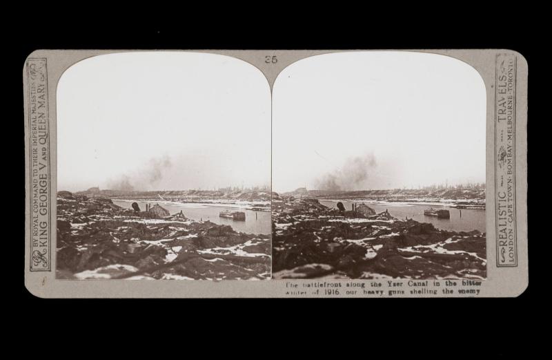 The battlefront along the Yser Canal in the bitter winter of 1916 our heavy guns shelling the enemy. From the box The Great War