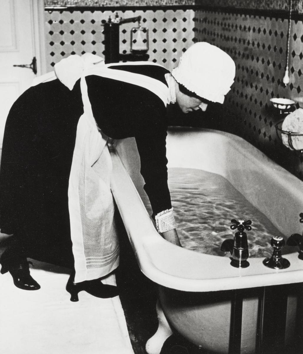 Parlourmaid Preparing a Bath Before Dinner