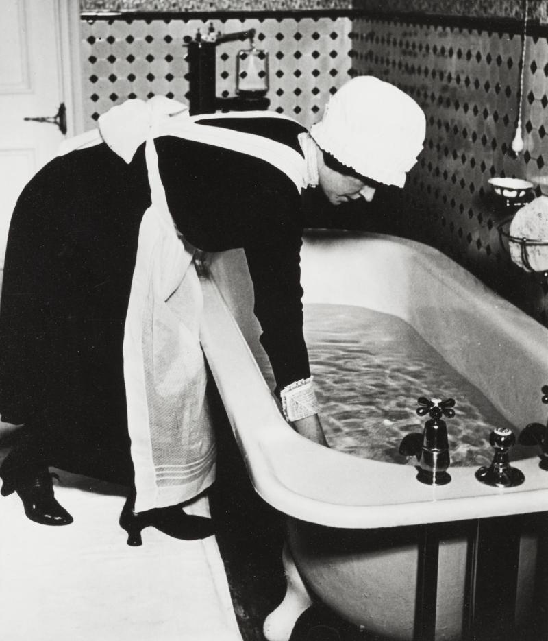 Parlourmaid Preparing a Bath Before Dinner