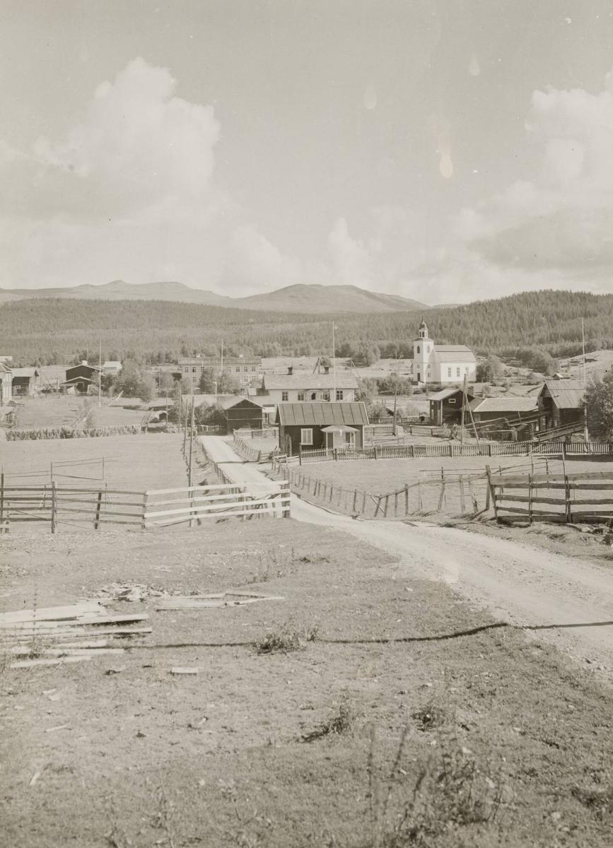 Ljusnedal by omkring kyrkan ( Herrgården brann ned påsken 1937)