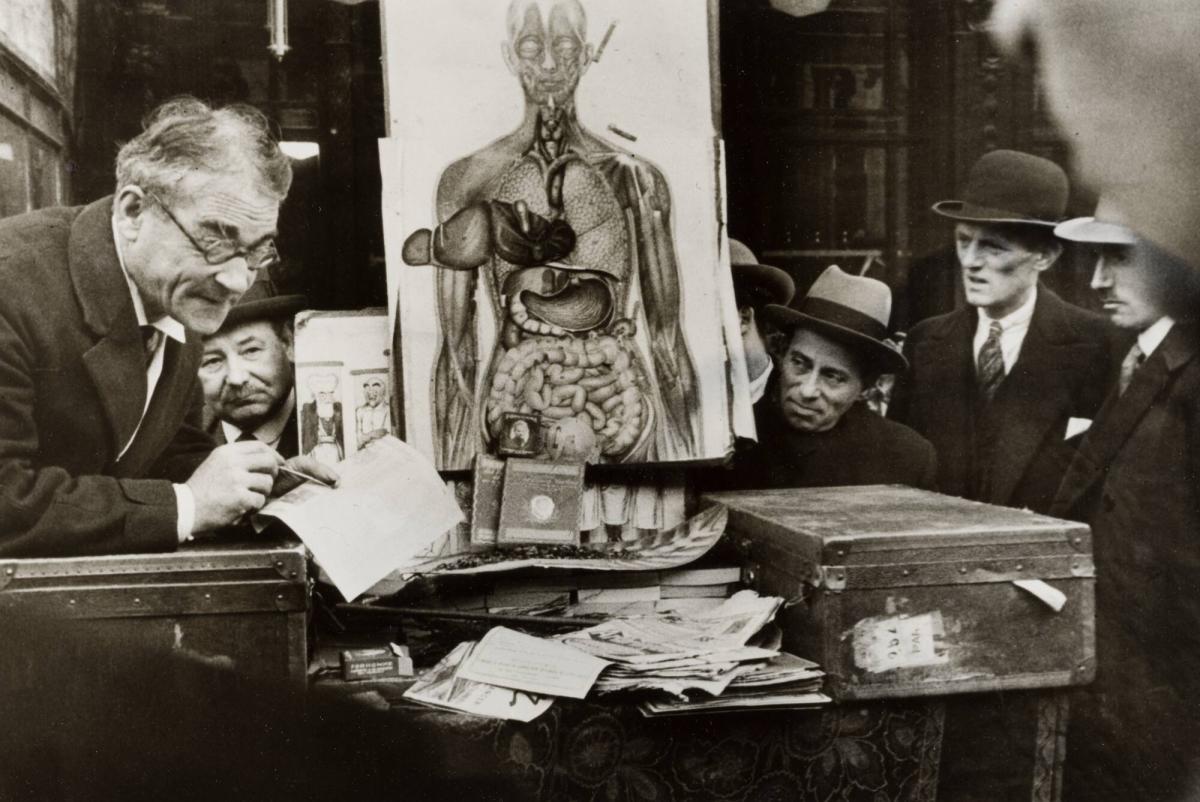 Barker selling patent medicine in the Paris Street.