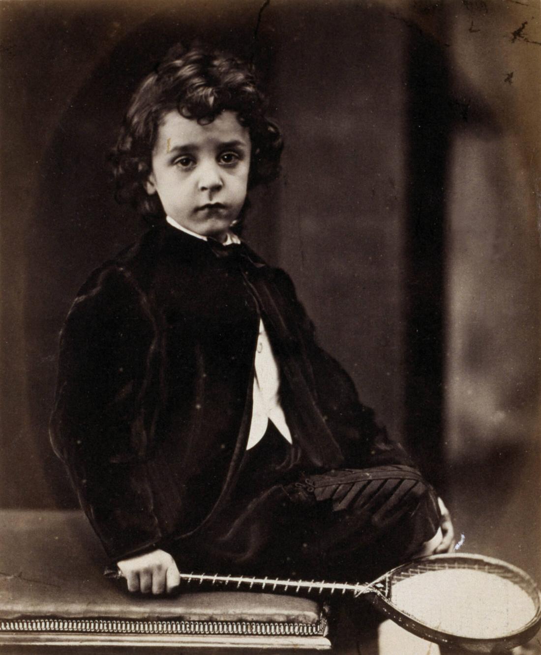 Boy with a Tennis Racquet
