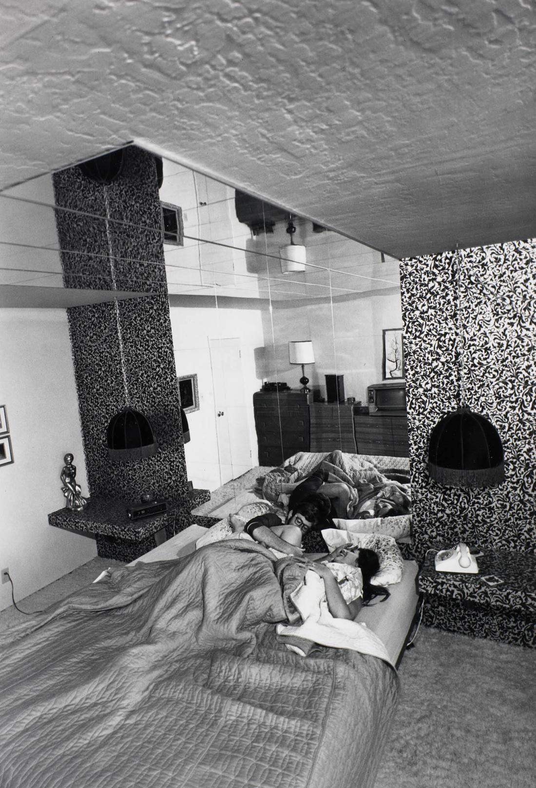 It's a great pleasure to watch yourself make love in the six dozen mirrors that line the ceilings and walls. I've spent a tremendous amount of thought and planning to get the total effect of the bedroom. From the series Suburbia