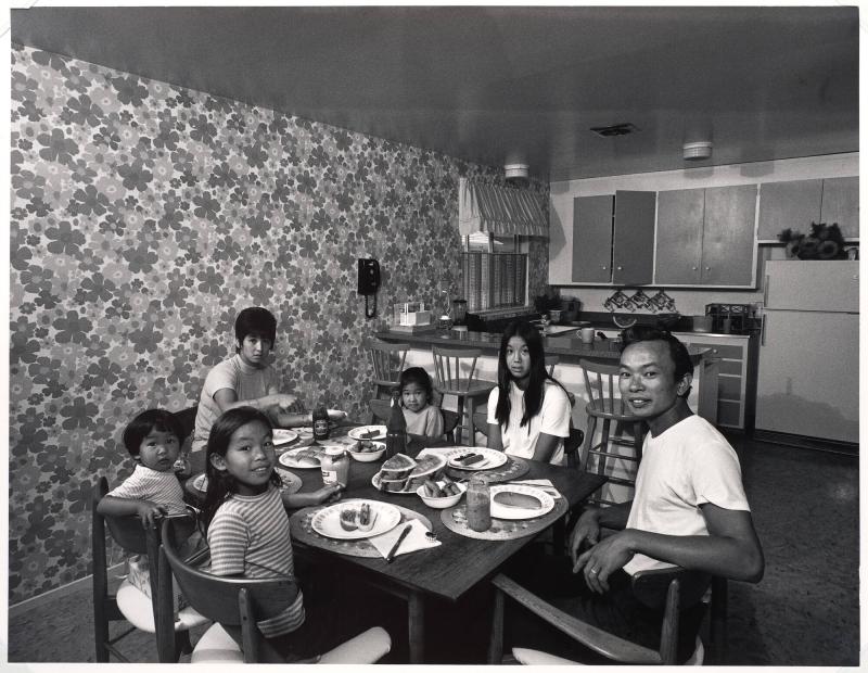 Because we live in the suburbs we don't eat too much Chinese food. It's not available in the supermarkets so on Saturday we eat hot dogs. From the series Suburbia