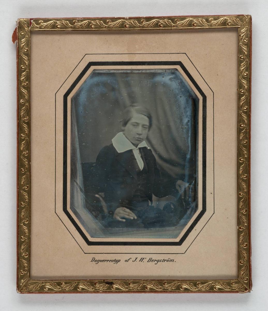 Porträtt av ung pojke