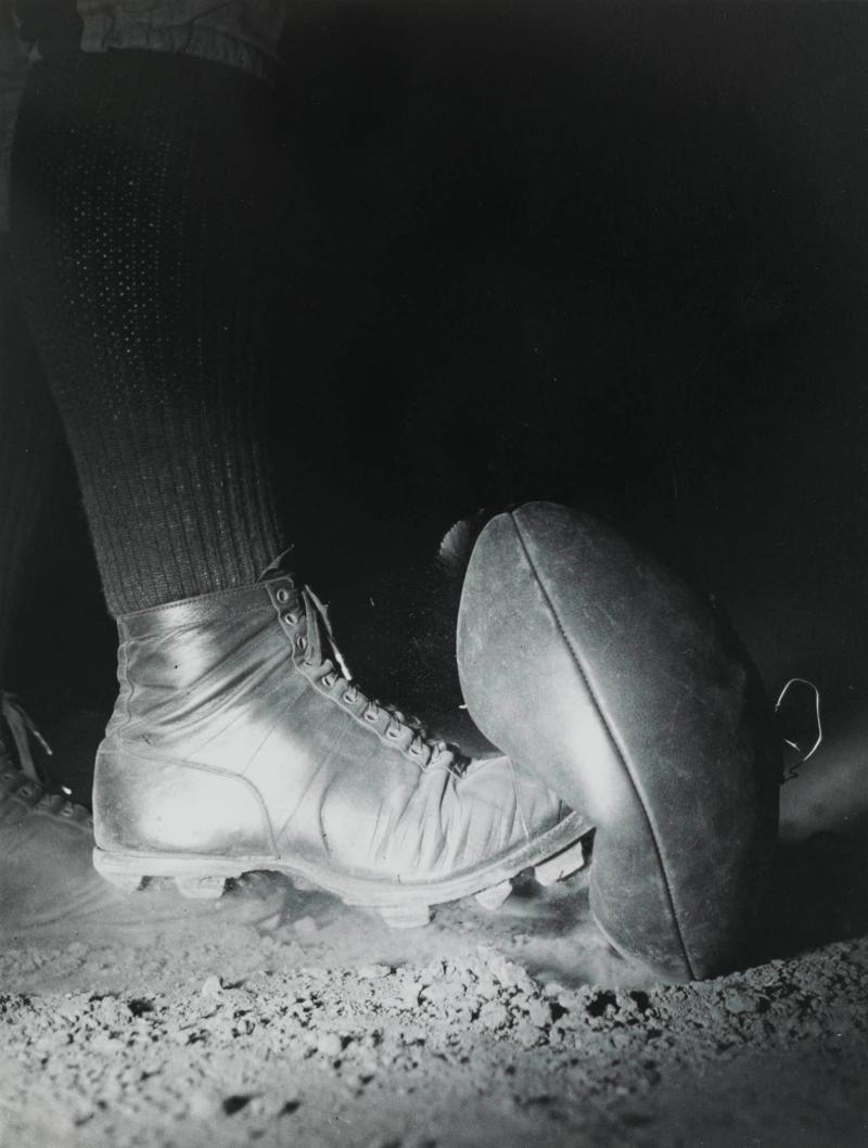 Football as it is being Kicked (Notice the Dust Suspended from the Top of the Ball)