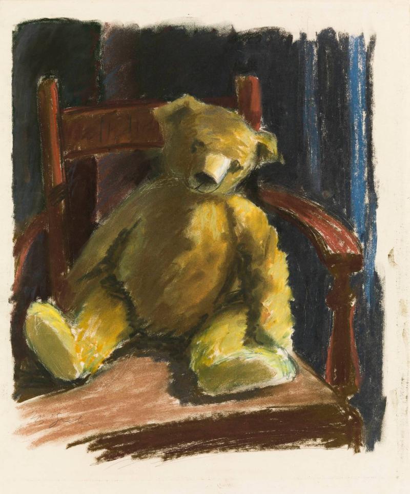 Teddybjörn sittande i en stol