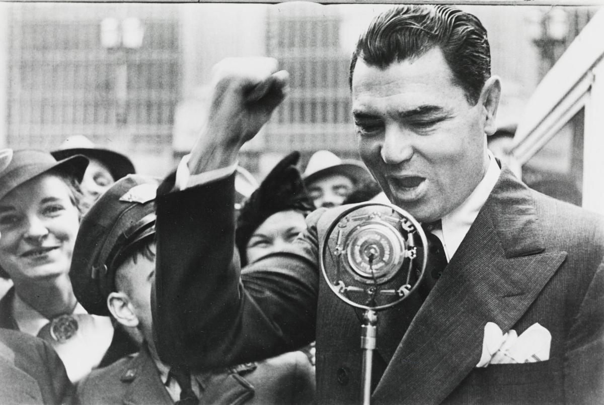 Formal heavy weight boxing world champion Jack Densey campaigning for Franklin Rossevelt during the 1936 presidential election.