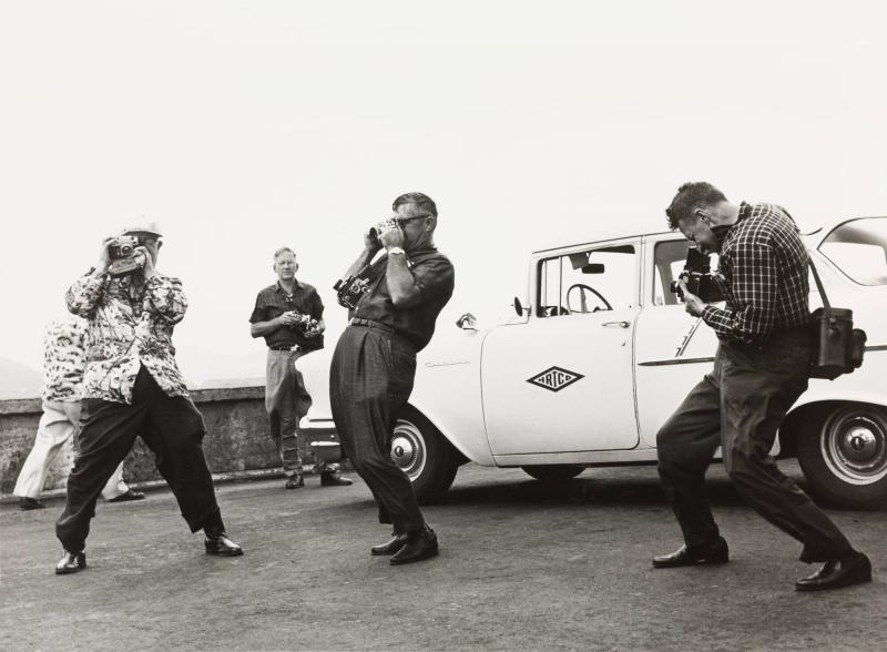 The Ballet of the photographers. American photographers on a windswept mountain on Hawaii