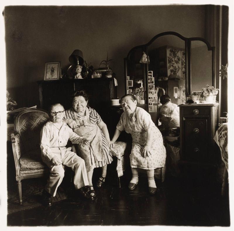 Russian midget friends in a living room on 100th Street, New York City
