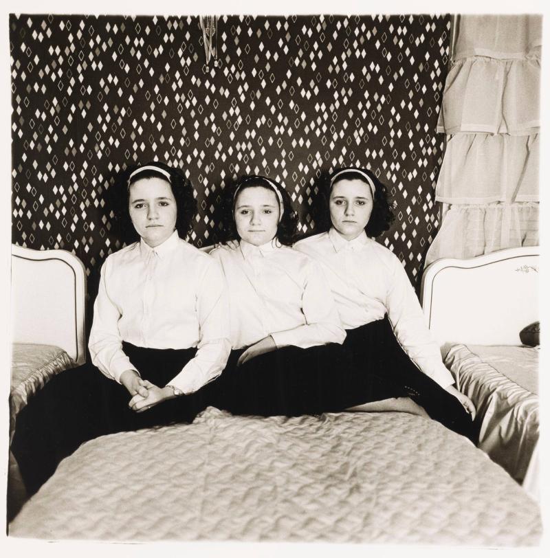 Triplets in their bedroom, N.J.