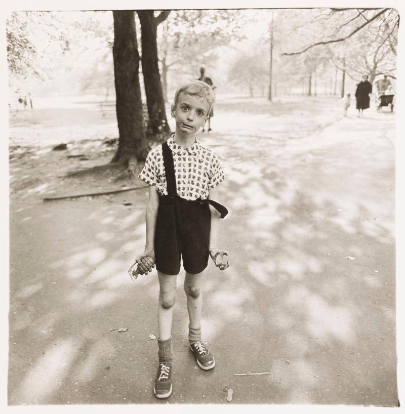 Child with a toy hand grenade in Central Park, New York City