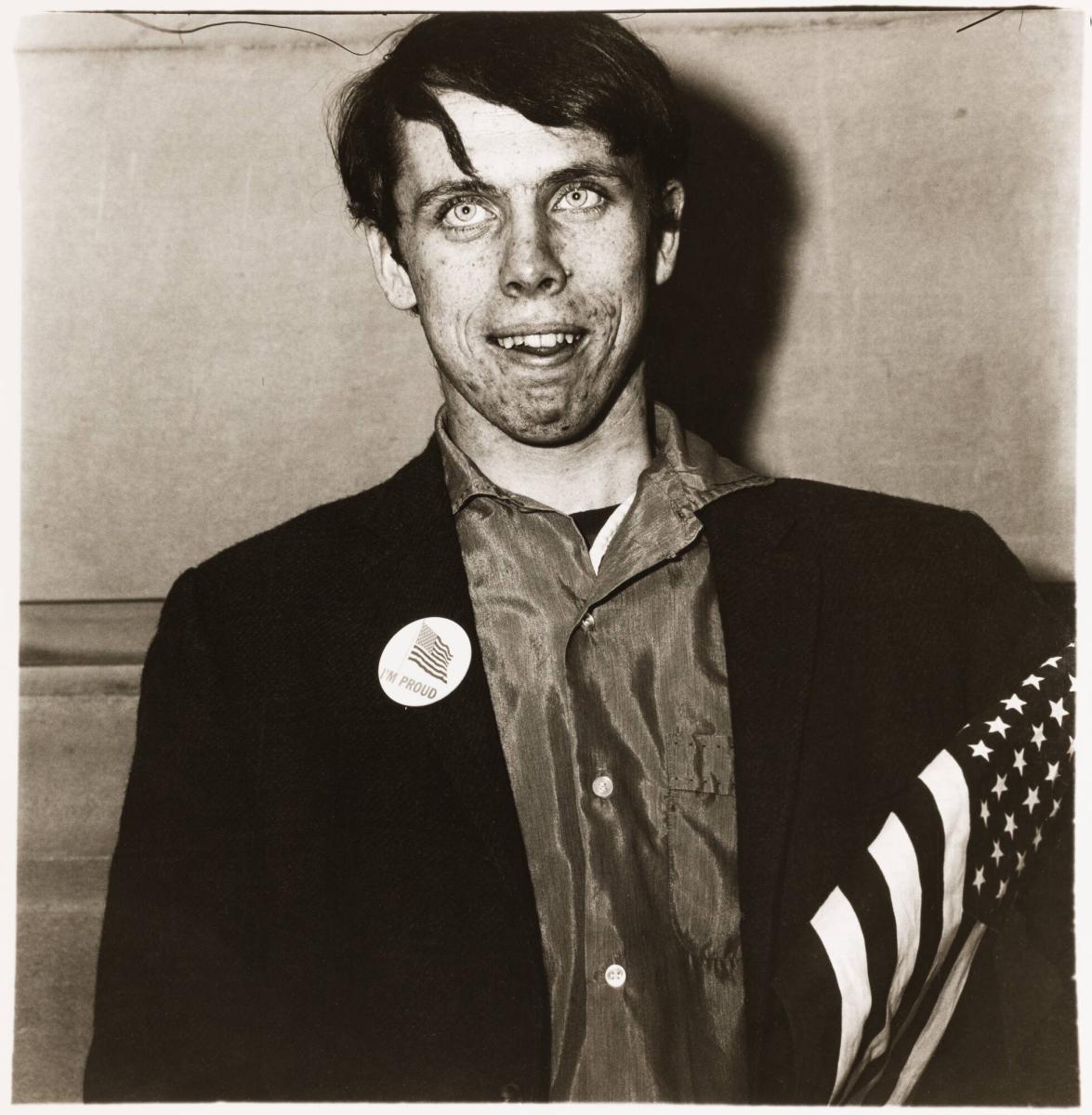 Patriotic young man with a flag, New York City