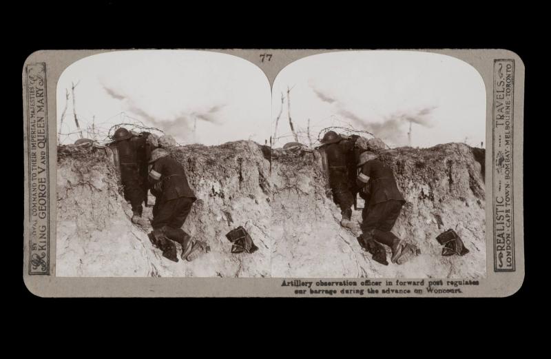 Artillery observation officer in forward post regulates our barrage during the advance on Woncourt. From the box The Great War
