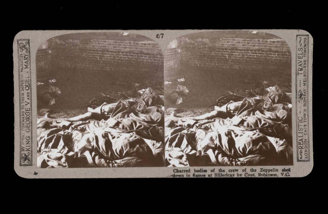 Charred bodies of the crew of the Zeppelin shot down in flames at Billericay by Capt. Robinson, V.C. . From the box The Great War
