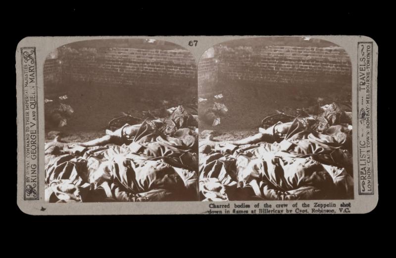 Charred bodies of the crew of the Zeppelin shot down in flames at Billericay by Capt. Robinson, V.C. . From the box The Great War
