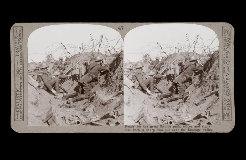 Ready for the great Somme push, officer and signallers keep a sharp look-out over the Sausage Valley. From the box The Great War