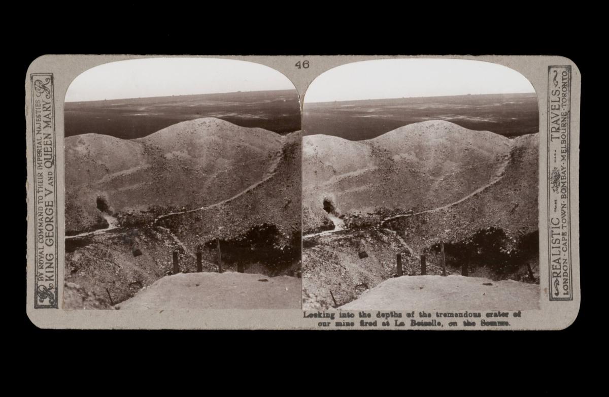 Looking into the depths of the tremendous crater of our mine fired at La Boiselle, on the Somme. From the box The Great War
