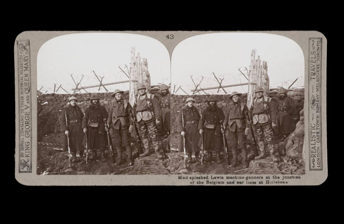 Mud-splashed Lewis machine-gunners at the junction of the Belgian and our lines at Hollebeke. From the box The Great War
