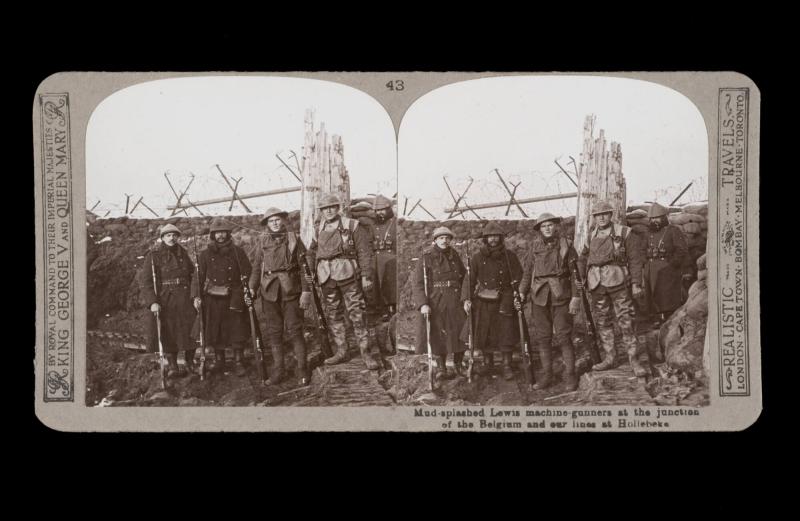 Mud-splashed Lewis machine-gunners at the junction of the Belgian and our lines at Hollebeke. From the box The Great War