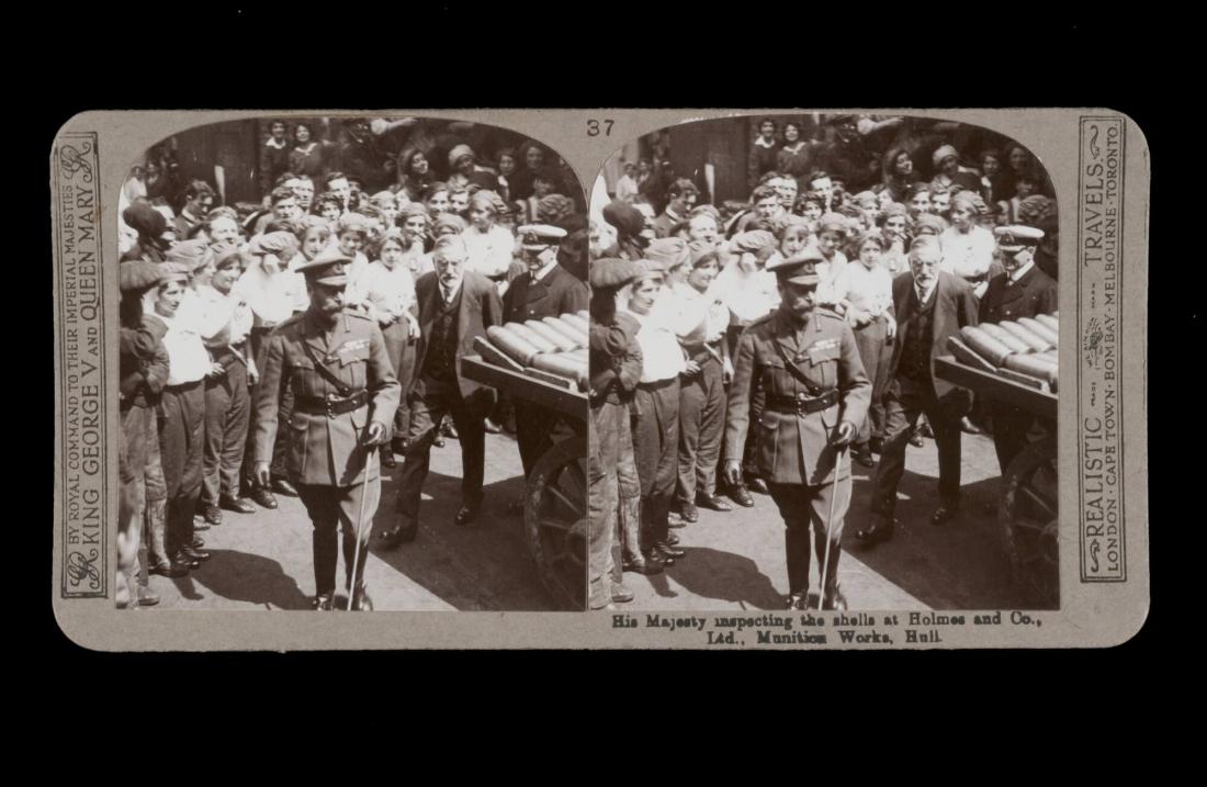 His Majesty inspecting the shells at Holmes and Co., Ltd., Munition Works, Hull. From the box The Great War