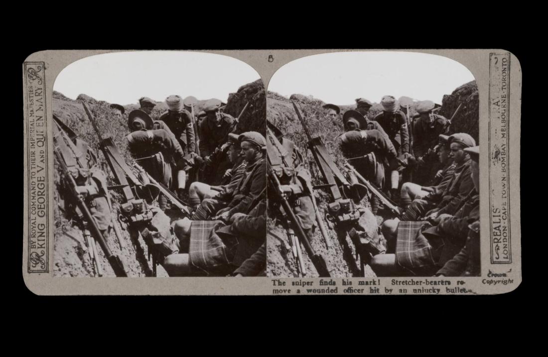 The sniper finds his mark! Stretcher-bearers remove a wounded officer hit by an unlucky bullet. From the box The Great War