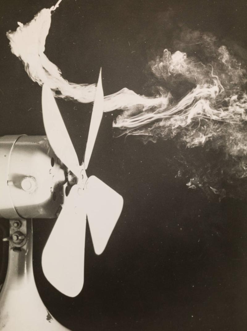 Smoke Passing Through the Blades of a Fan