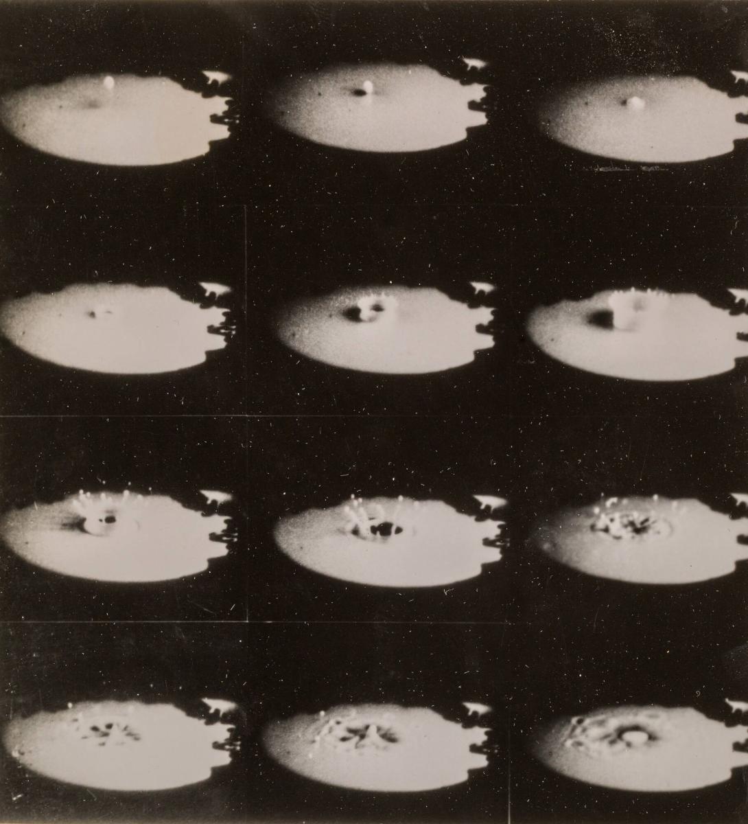 The Splash of a Drop of Milk on a Plate Covered by a Thin Layer of Milk