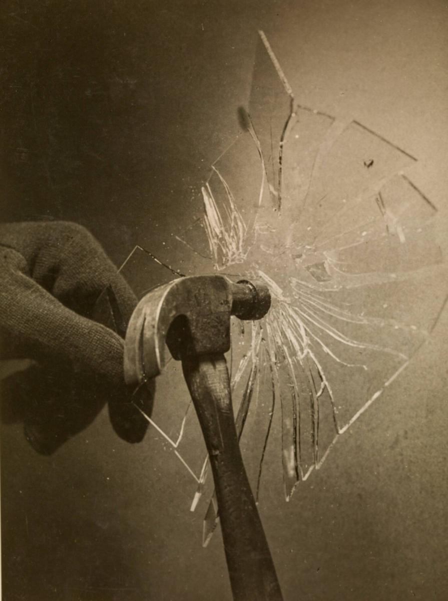 Shattering of a Pane of Glass with a Hammer