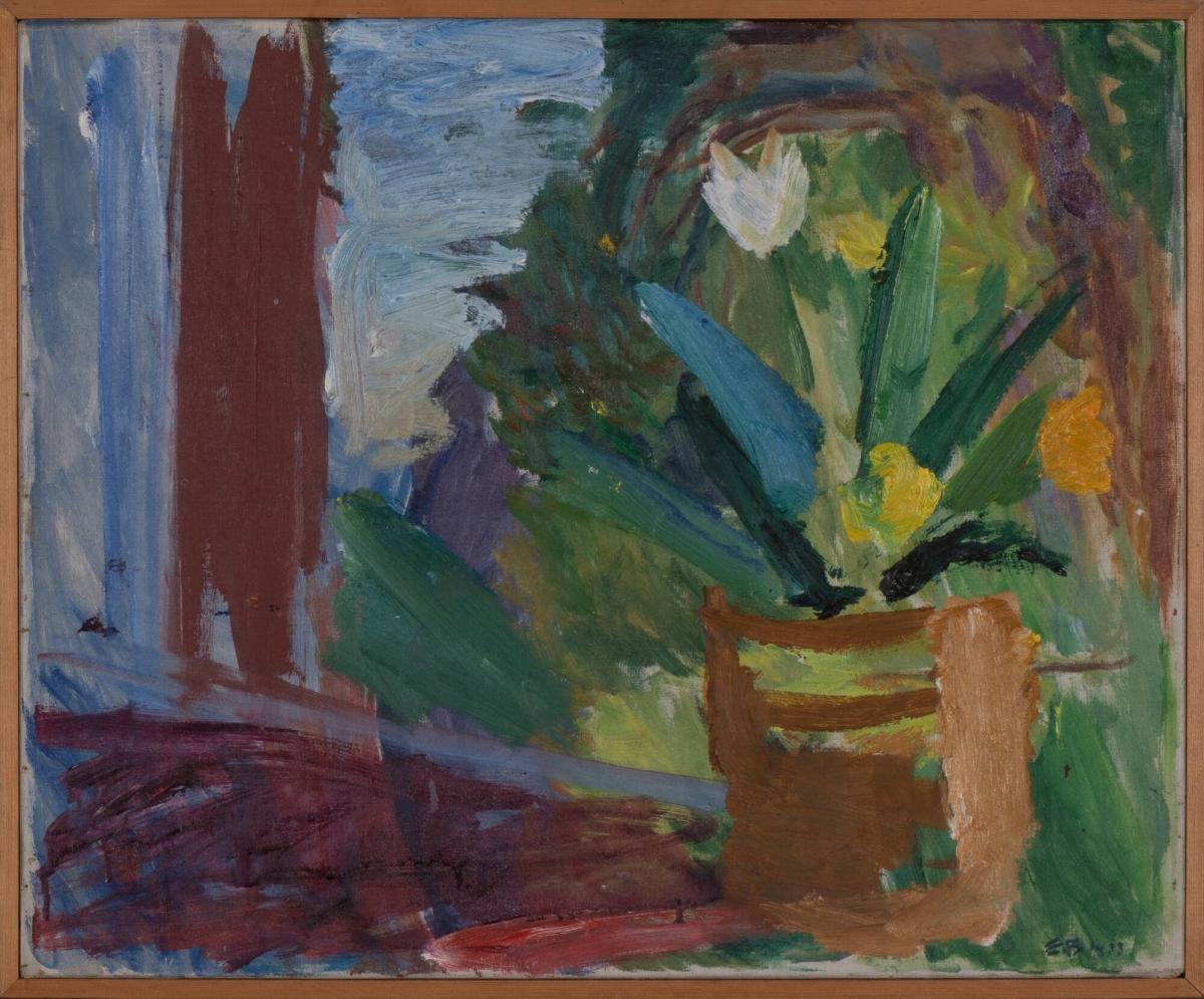 Blommor i gul kruka